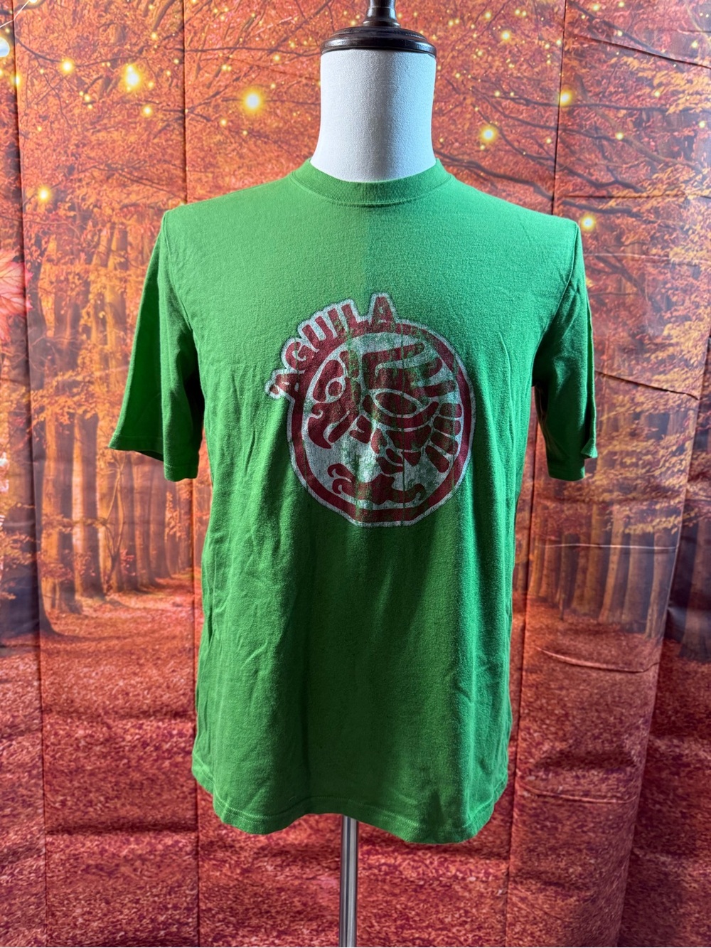 304-Express Green Short Sleeve Tee with Red Graphic Emblem